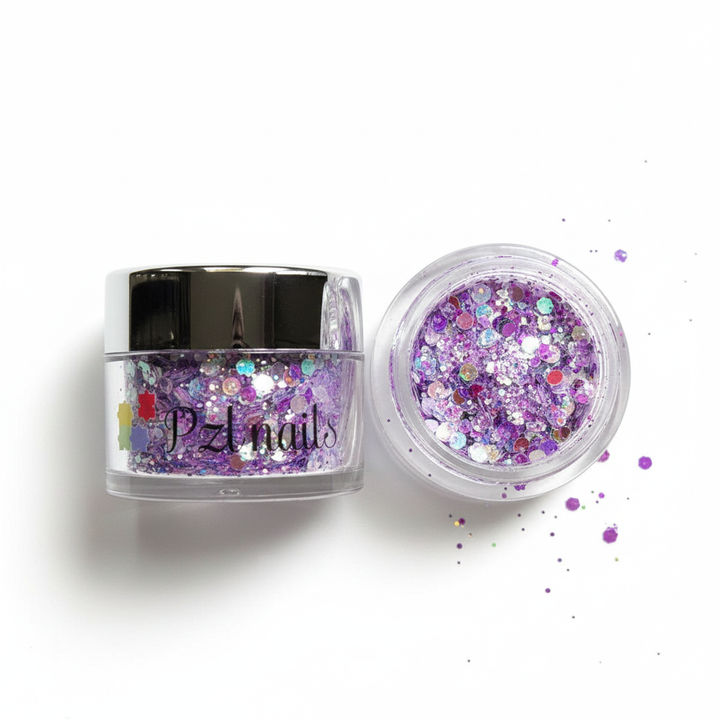 Open jar of purple glitter with scattered glitter on a white background, featuring 'Pzl Nails' branding.