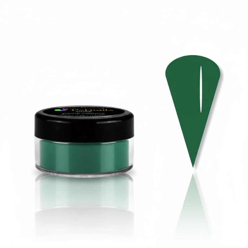 Green powder in a small open jar with a green spoon on a white background