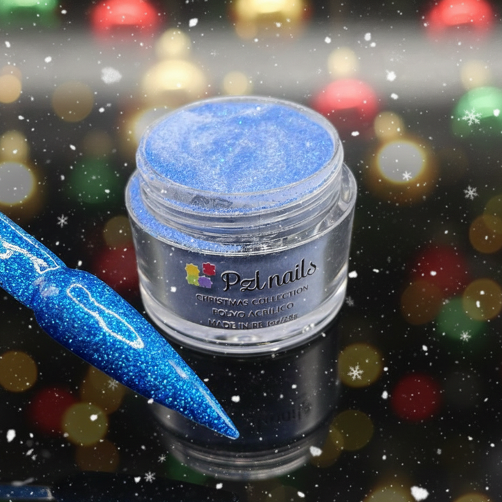 Blue glitter nail polish jar and brush with festive lights in the background