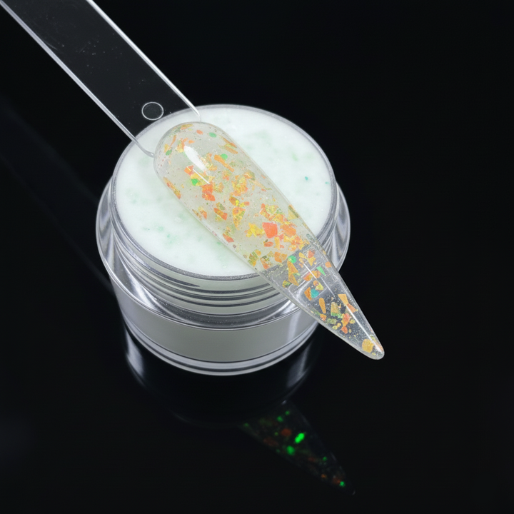 Nail art gel with a brush applicator on a black background