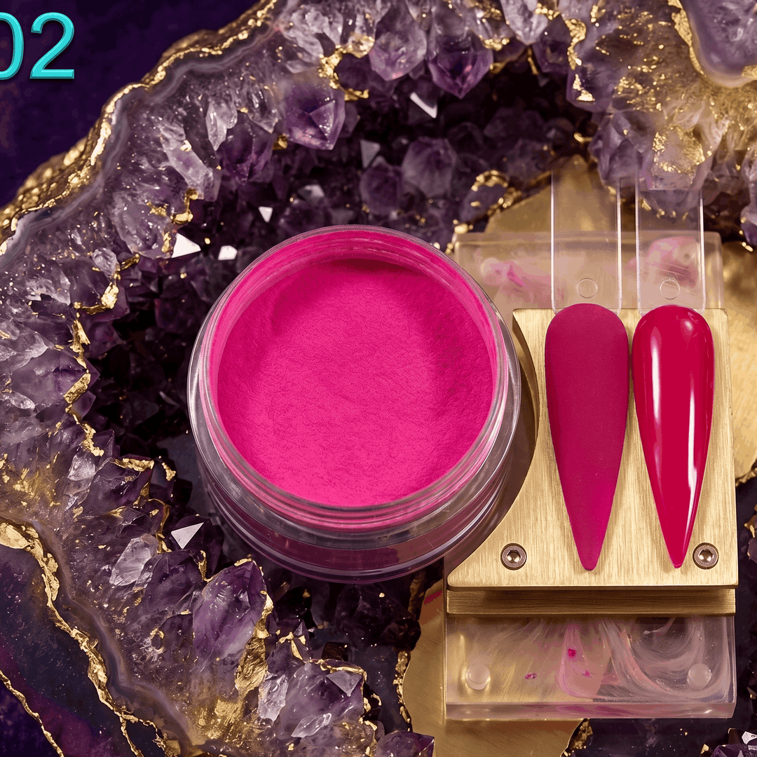 Pink makeup product with applicators on a decorative purple and gold background