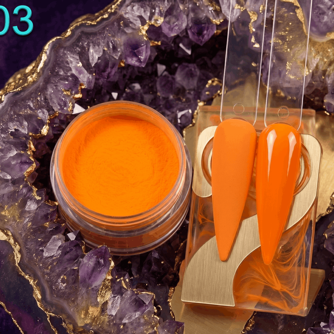 Orange powder in a jar with orange tools on a purple crystal background