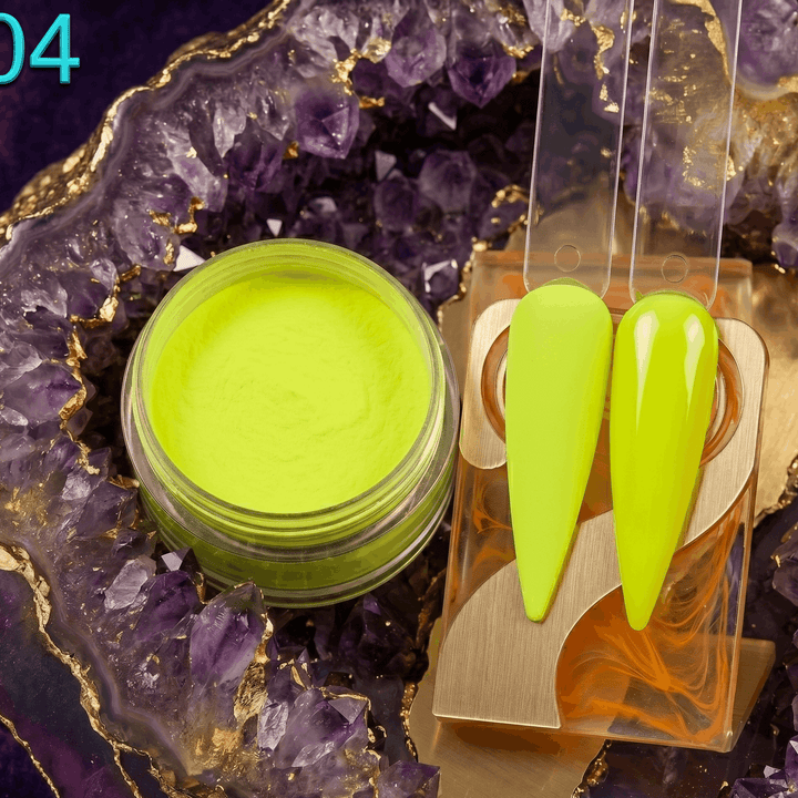 Jar of green powder and green nail tips on a decorative purple stone background