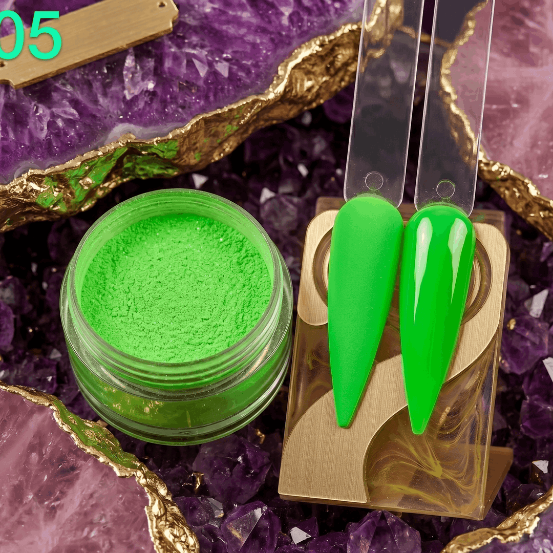 Green powder in a jar with green nail tips on a purple crystal background