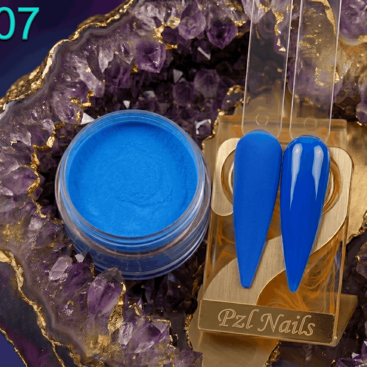 Blue nail polish jar and nail forms on a decorative purple geode background with &